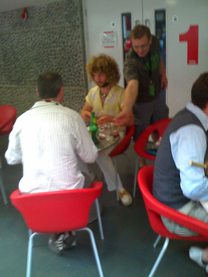 At 'Meet The Press' - this is the guy from The Sun. Not in costume, even though he looks like he's come as a Bee Gee.
